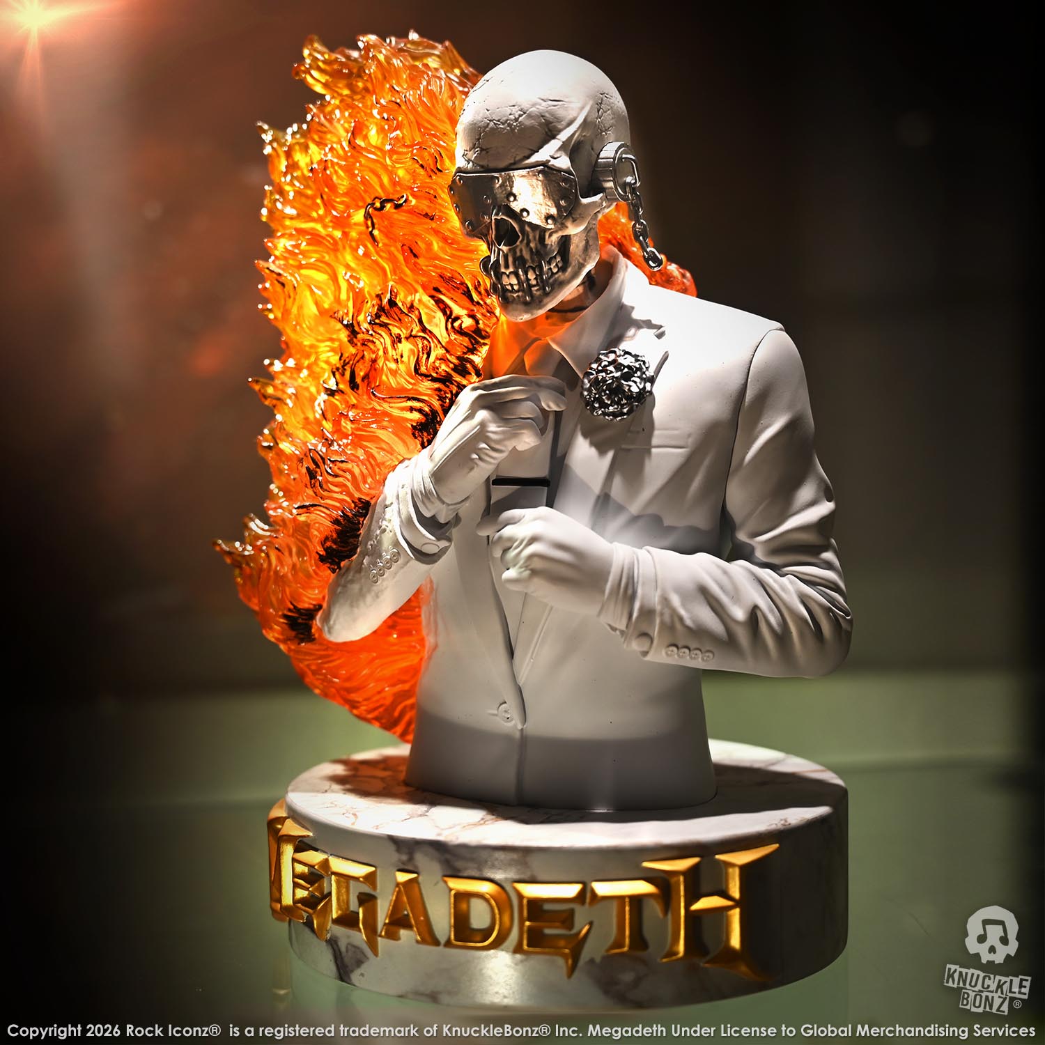 Limited edition statue of a skeleton in a white suit with red and orange flames. The statue s part of the 3D Vinyl KnuckleBonz collection.