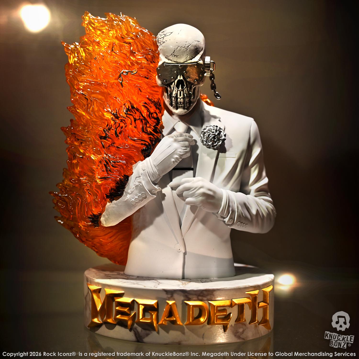 Limited edition statue of a skeleton in a white suit with red and orange flames. The statue s part of the 3D Vinyl KnuckleBonz collection.