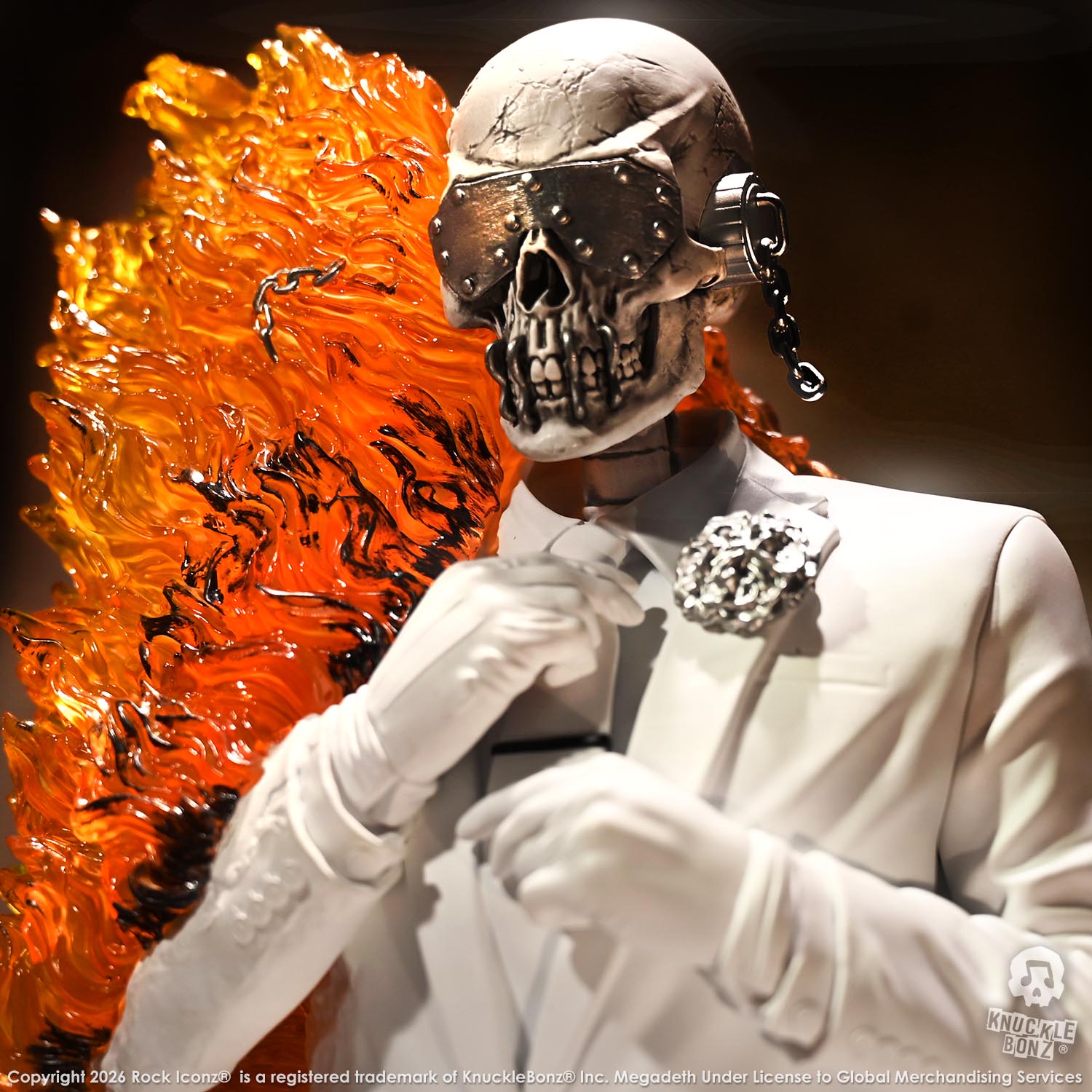 Limited edition statue of a skeleton in a white suit with red and orange flames. The statue s part of the 3D Vinyl KnuckleBonz collection.