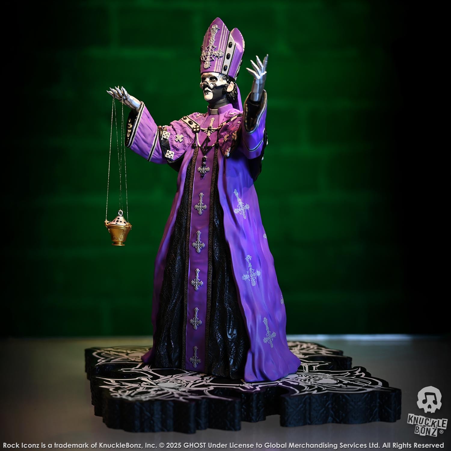 Statue of Papa V Perpetua from Ghost  in a purple robe with a green background