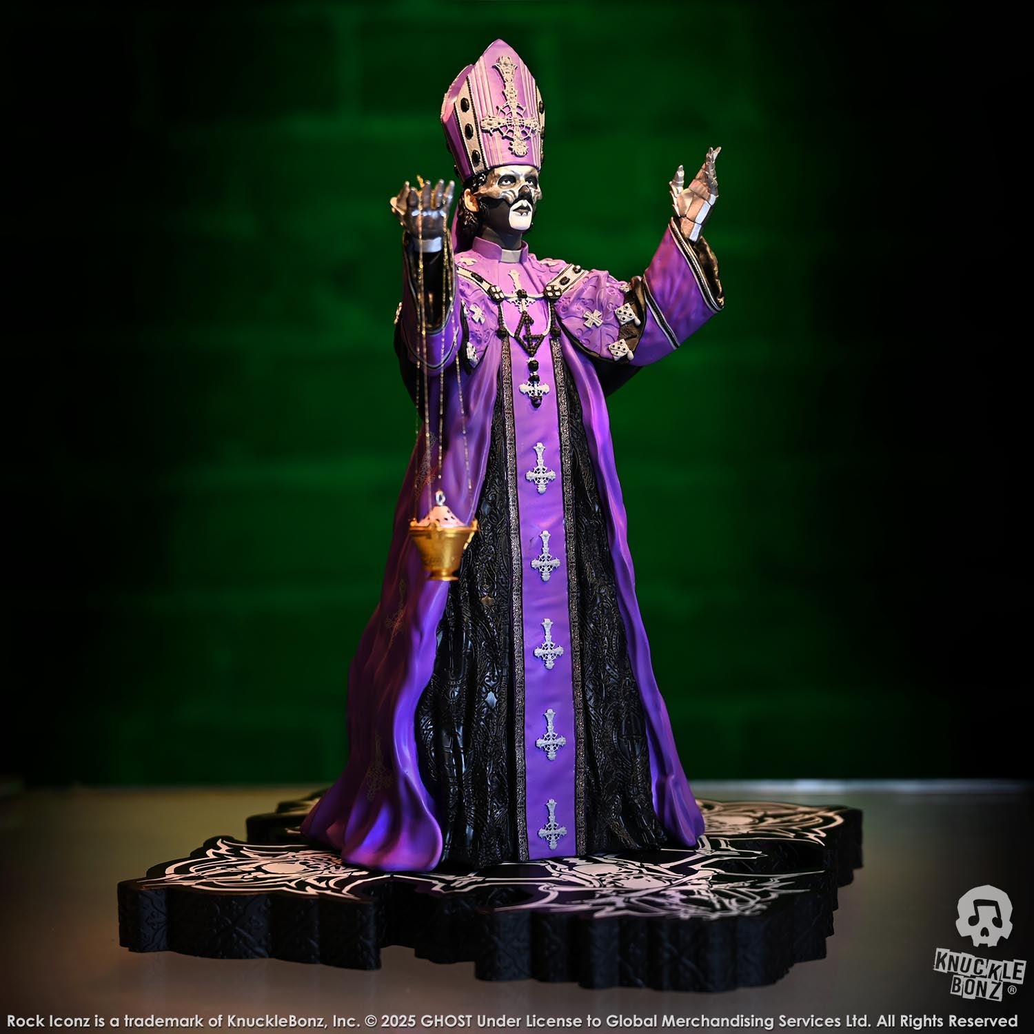 Statue of Papa V Perpetua from Ghost  in a purple robe with a green background