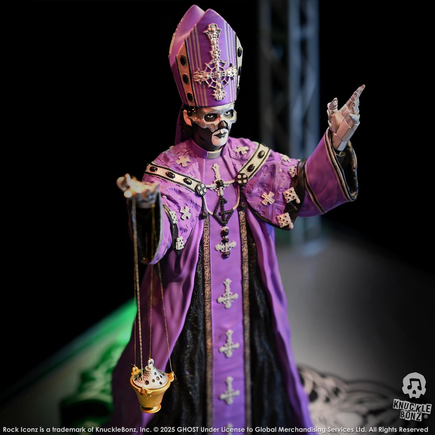 Statue of Papa V Perpetua from Ghost in a purple robe with a green background