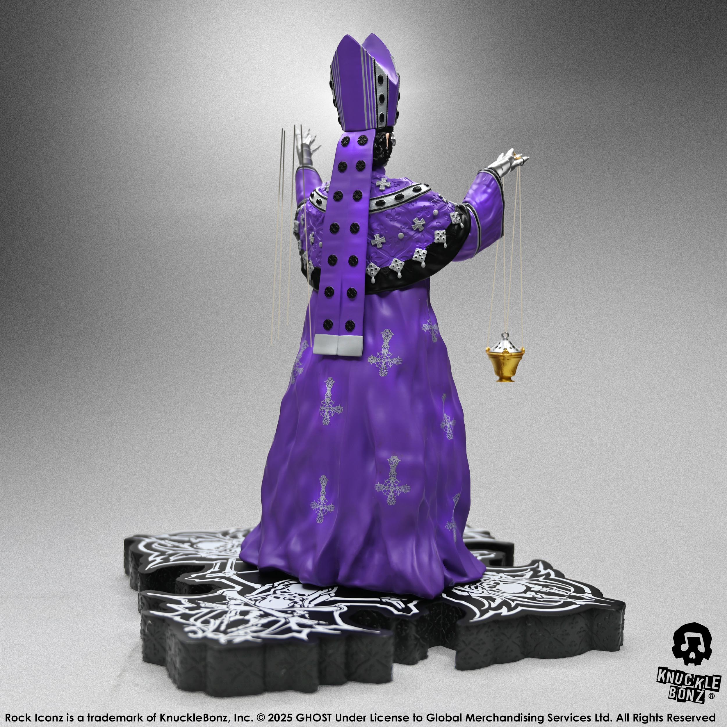 Statue of Papa V Perpetua from Ghost in a purple robe with a white background