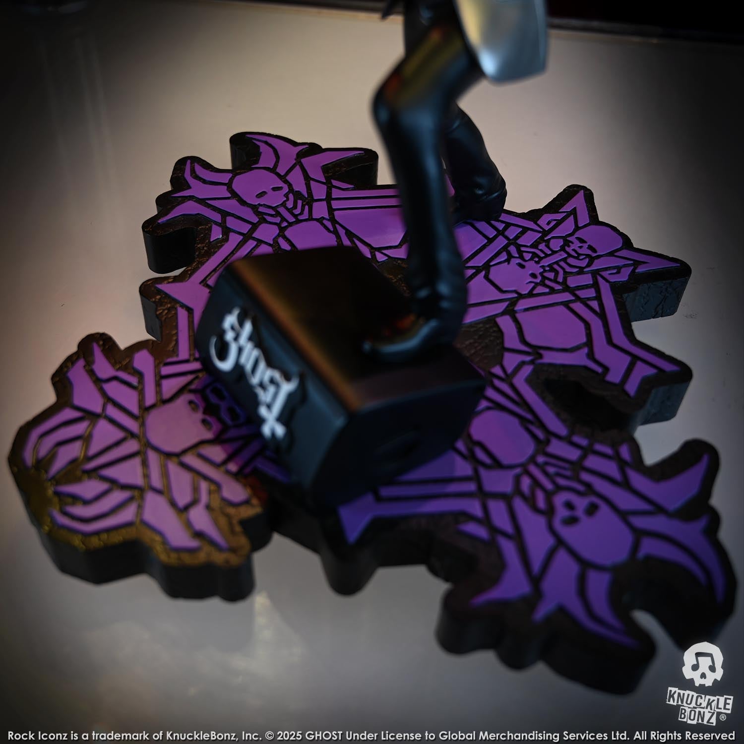 Statue of Papa V Perpetua from Ghost with a purple designed base