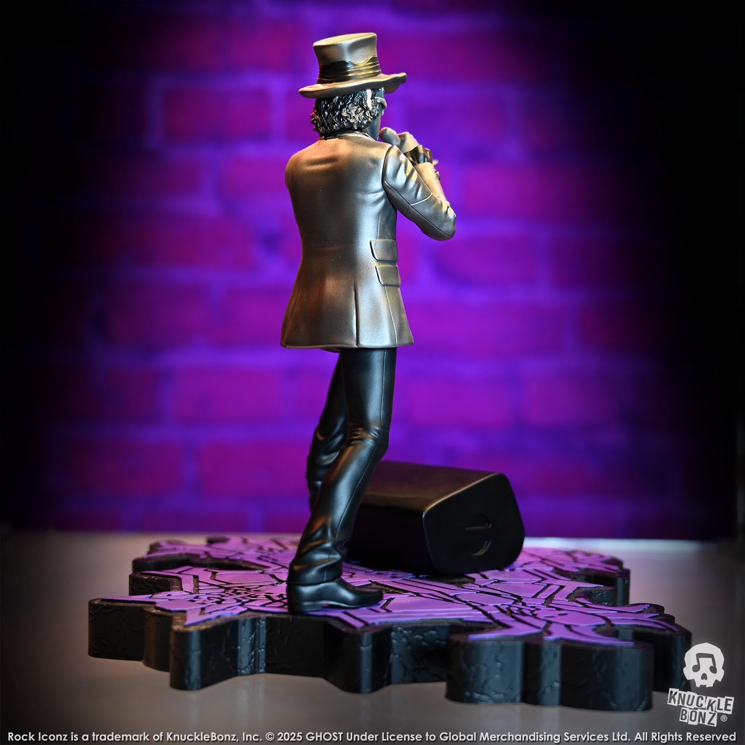 Statue of Papa V Perpetua from Ghost in a silver suit coat and top hat with a purple background