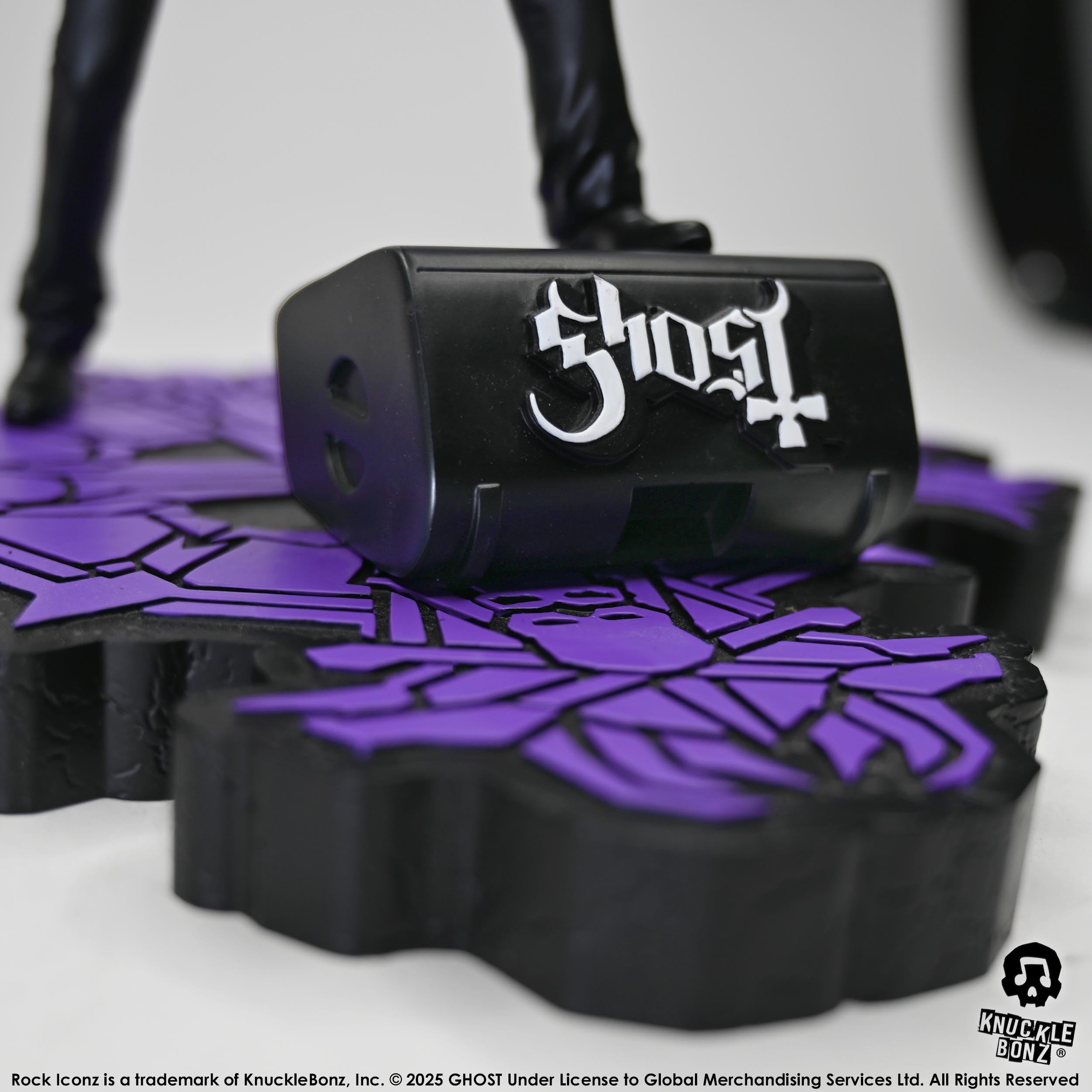 The Purple base and speaker with the Ghost logo of the Papa V Perpetua from Ghost